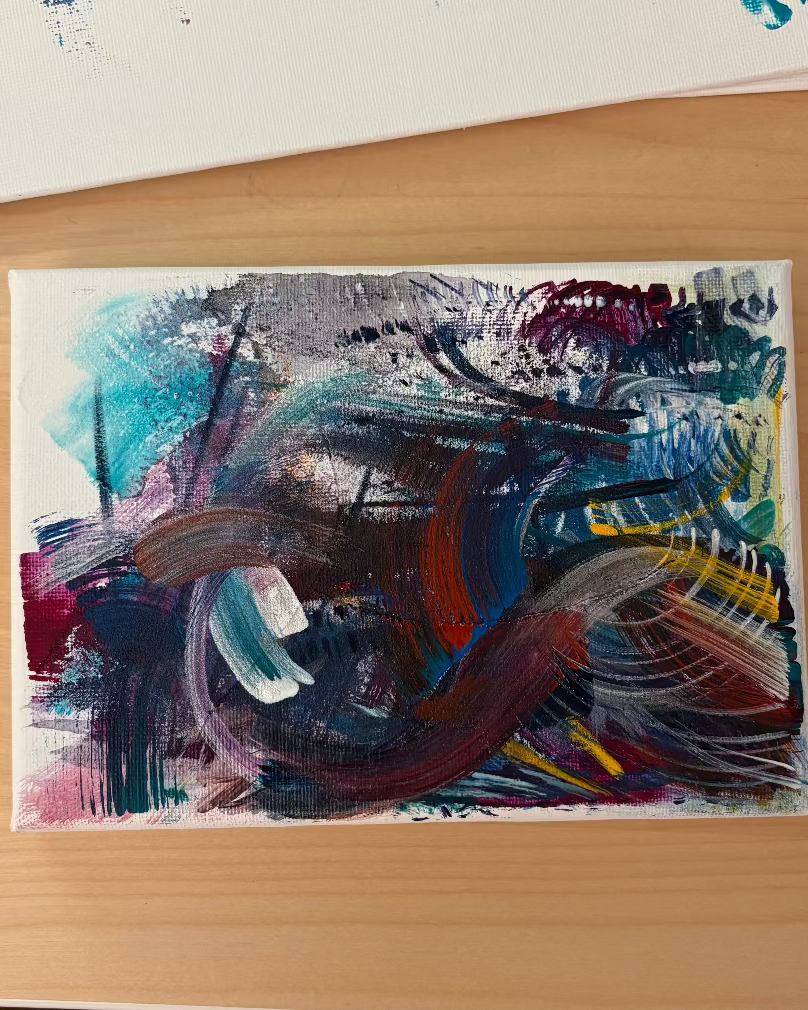 Abstract painting on a wooden surface