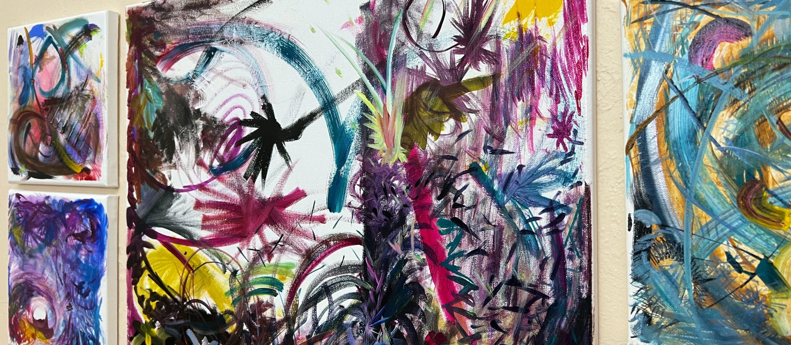 Set of abstract paintings on a wall